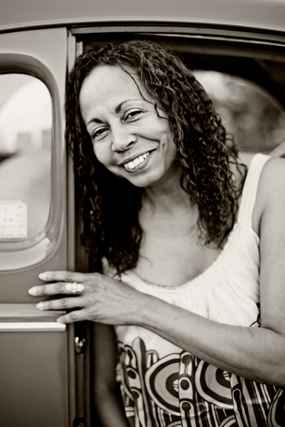 Woman in vintage car, black and white
