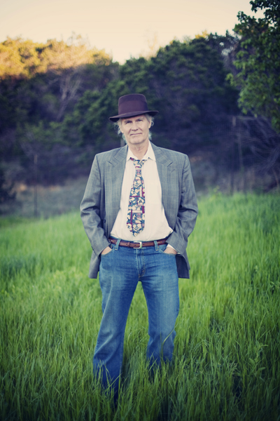 Phil in field with fedora